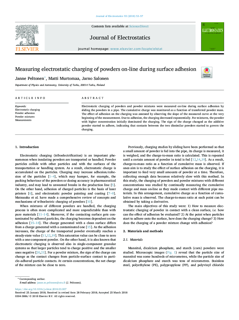 Measuring electrostatic charging of powders on-line during surface adhesion