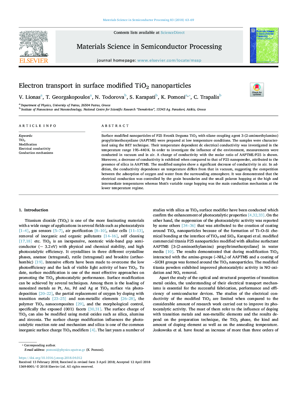 Electron transport in surface modified TiO2 nanoparticles