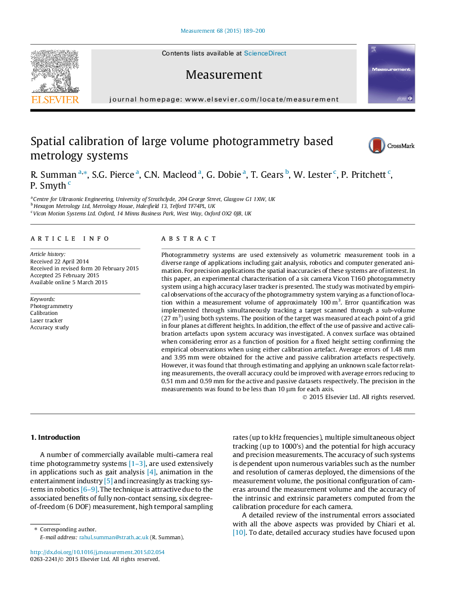 Spatial calibration of large volume photogrammetry based metrology systems