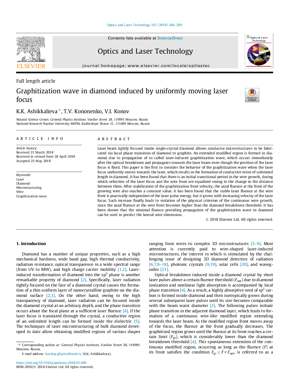 Graphitization wave in diamond induced by uniformly moving laser focus