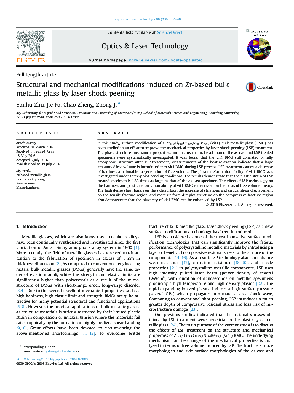 Structural and mechanical modifications induced on Zr-based bulk metallic glass by laser shock peening