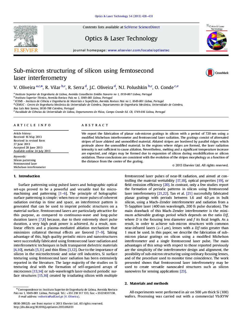 Sub-micron structuring of silicon using femtosecond laser interferometry