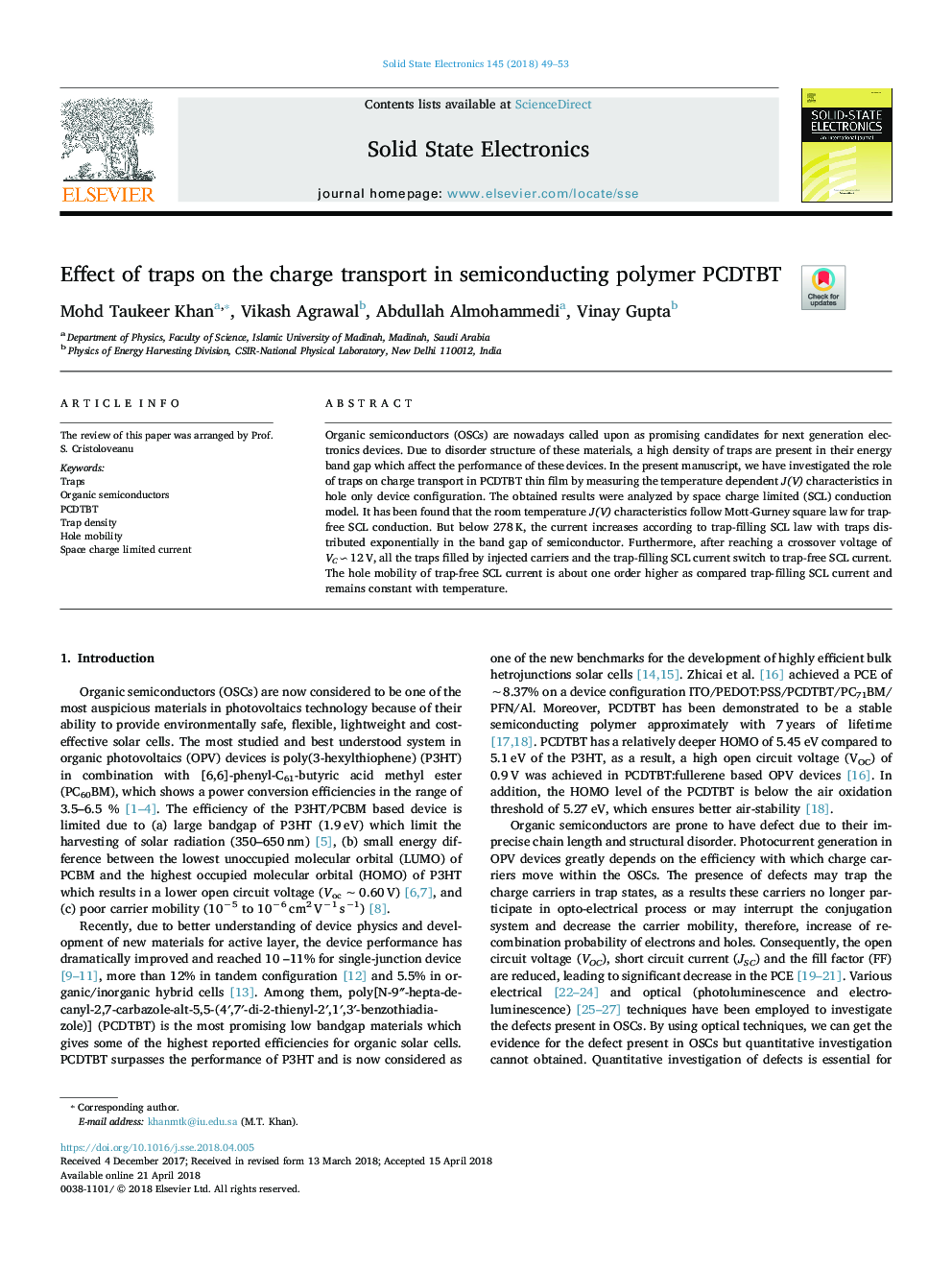 Effect of traps on the charge transport in semiconducting polymer PCDTBT