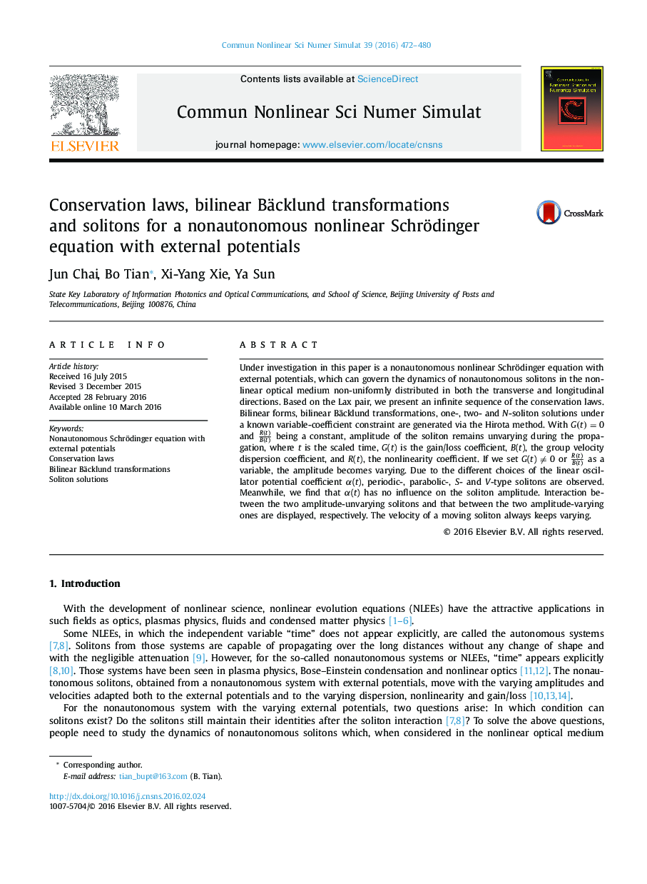 Conservation laws, bilinear Bäcklund transformations and solitons for a nonautonomous nonlinear Schrödinger equation with external potentials