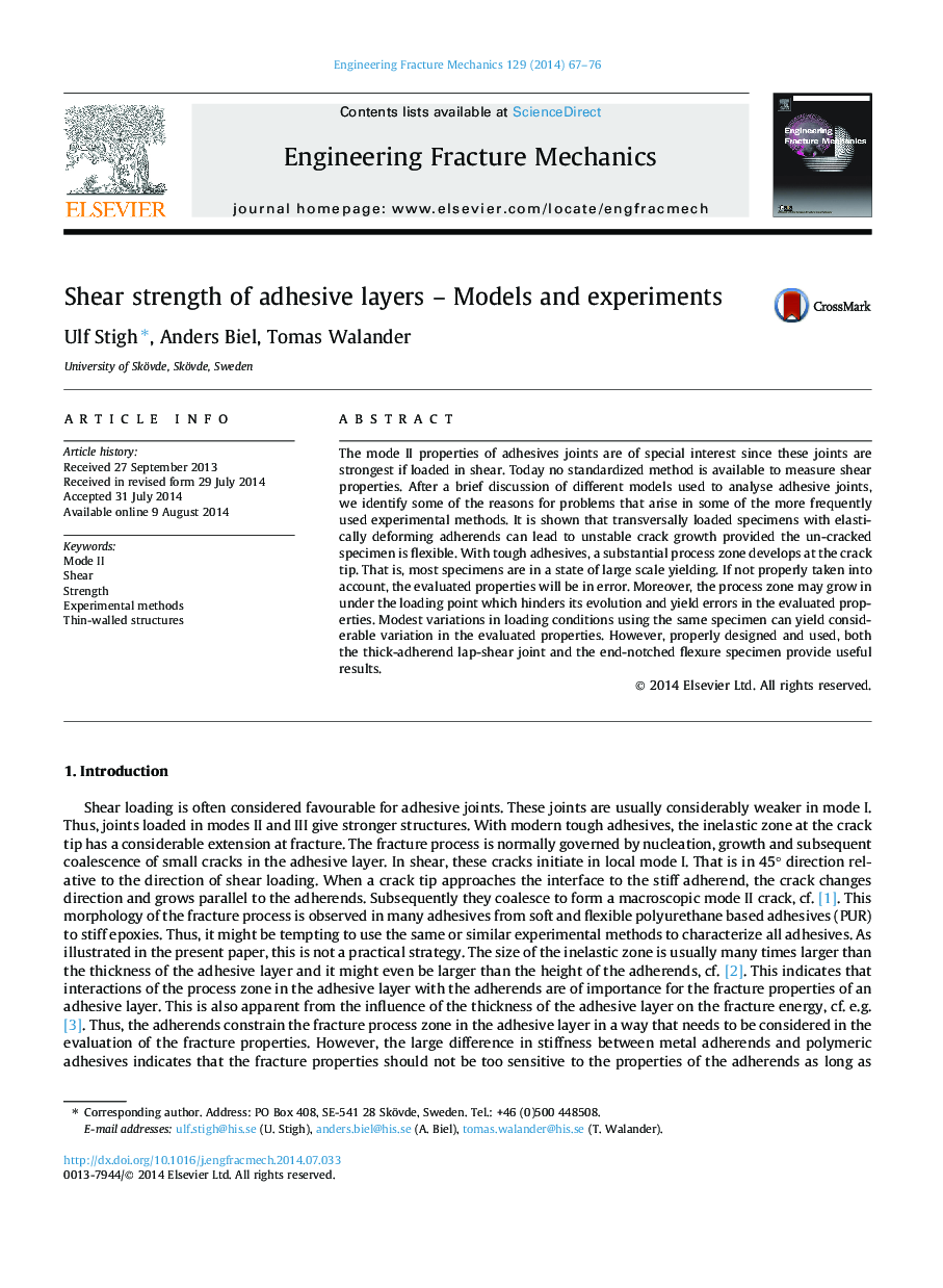 Shear strength of adhesive layers - Models and experiments