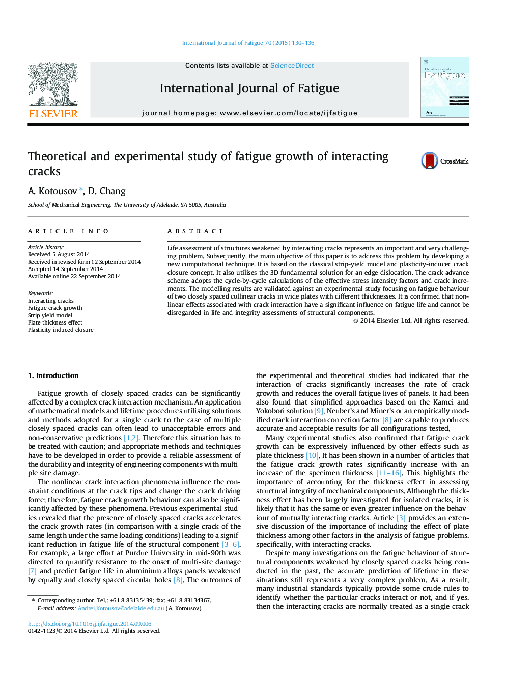 Theoretical and experimental study of fatigue growth of interacting cracks