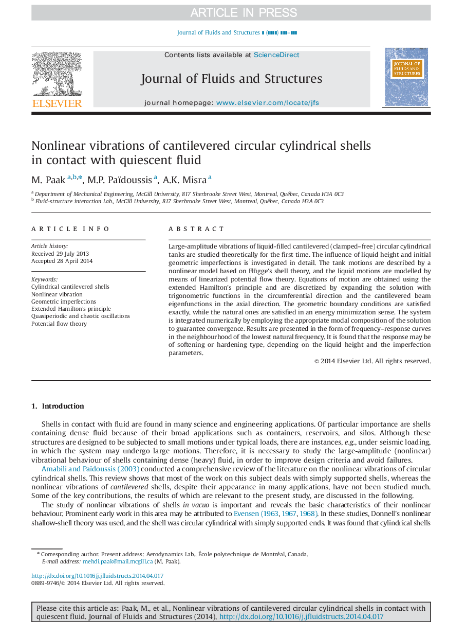 Nonlinear vibrations of cantilevered circular cylindrical shells in contact with quiescent fluid