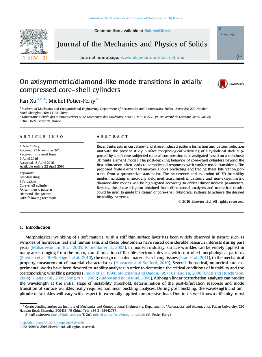 On axisymmetric/diamond-like mode transitions in axially compressed core-shell cylinders