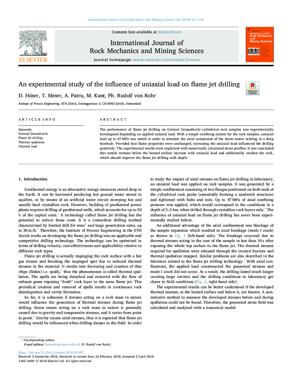 An experimental study of the influence of uniaxial load on flame jet drilling