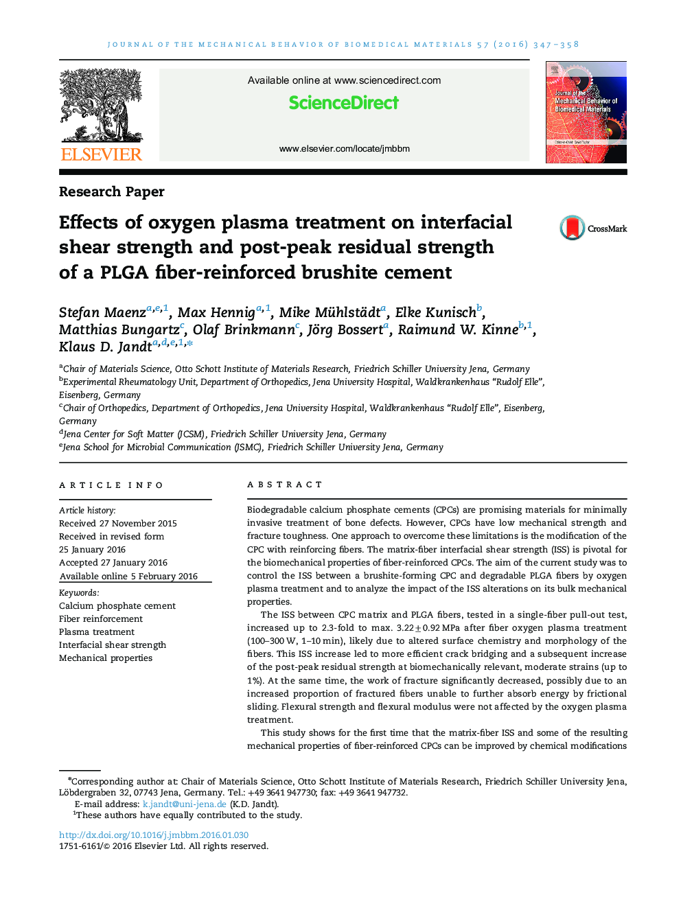 Effects of oxygen plasma treatment on interfacial shear strength and post-peak residual strength of a PLGA fiber-reinforced brushite cement