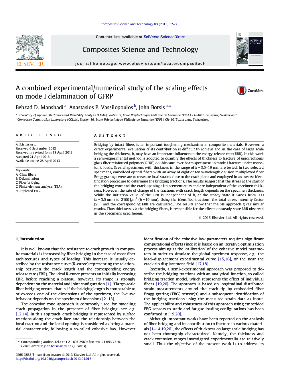 A combined experimental/numerical study of the scaling effects on mode I delamination of GFRP