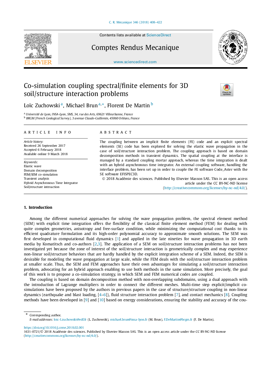 Co-simulation coupling spectral/finite elements for 3D soil/structure interaction problems