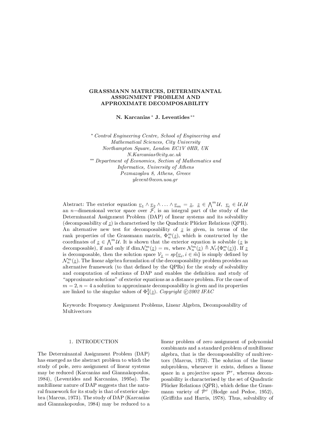 GRASSMANN MATRICES, DETERMINANTAL ASSIGNMENT PROBLEM AND APPROXIMATE DECOMPOSABILITY