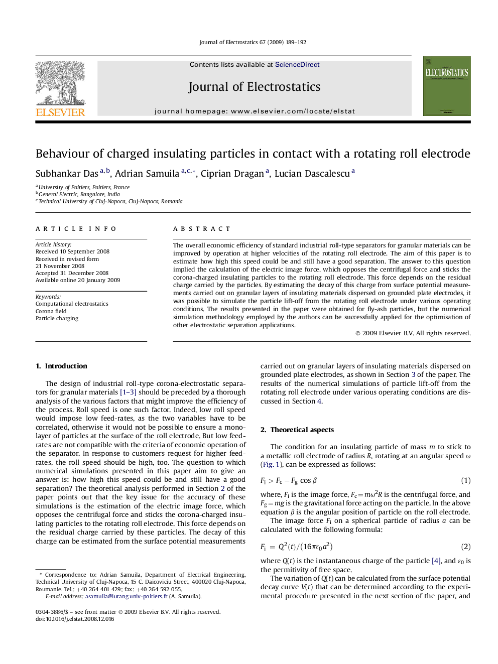 Behaviour of charged insulating particles in contact with a rotating roll electrode