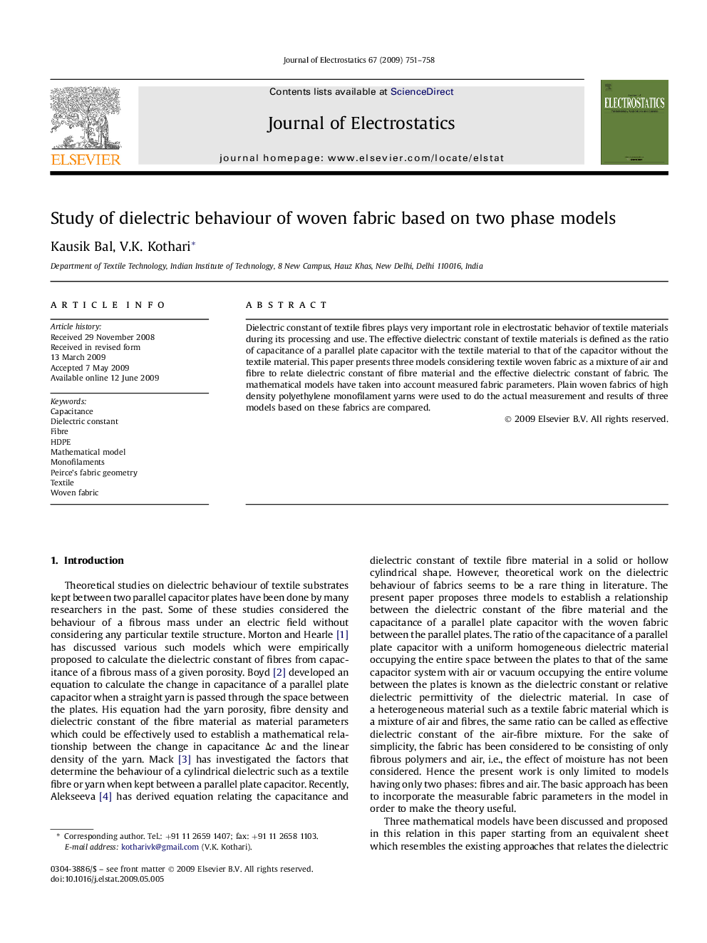 Study of dielectric behaviour of woven fabric based on two phase models