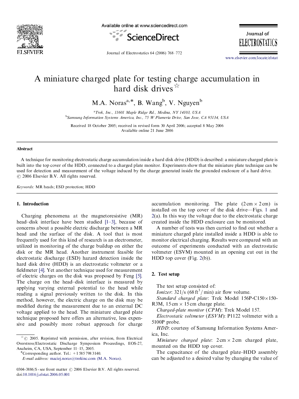 A miniature charged plate for testing charge accumulation in hard disk drives