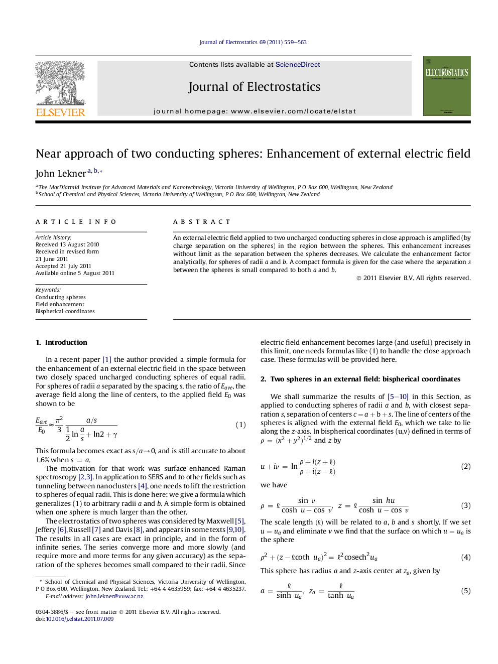 Near approach of two conducting spheres: Enhancement of external electric field