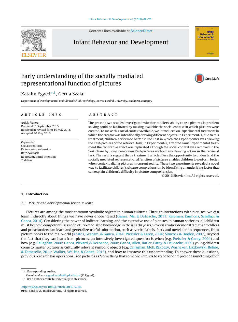 Early understanding of the socially mediated representational function of pictures