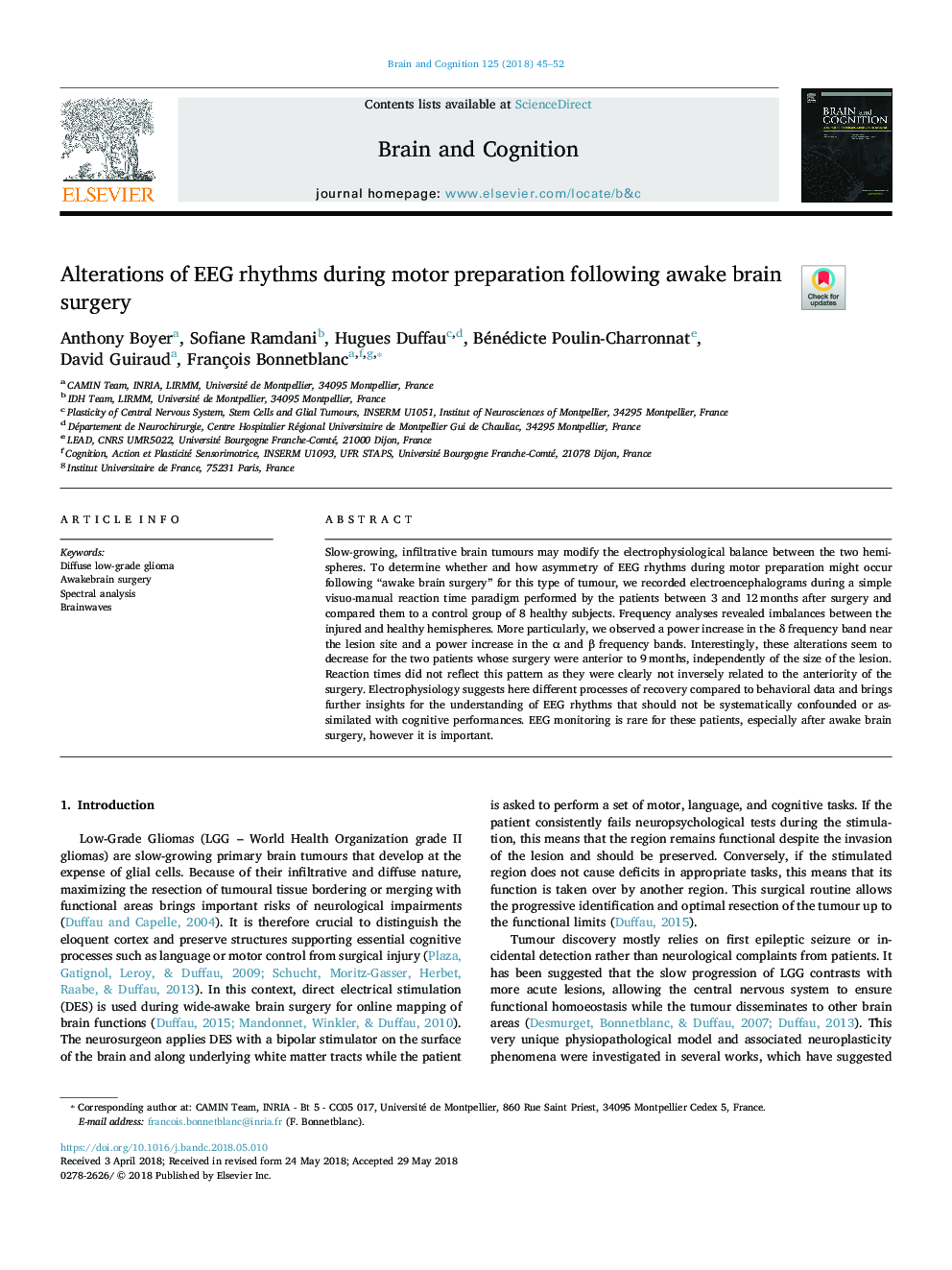 Alterations of EEG rhythms during motor preparation following awake brain surgery