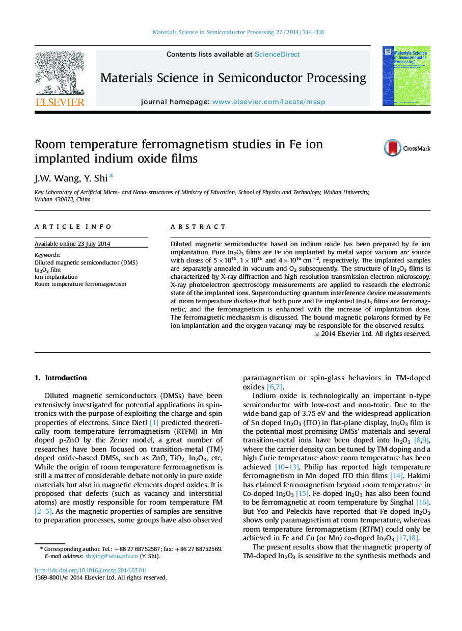 Room temperature ferromagnetism studies in Fe ion implanted indium oxide films