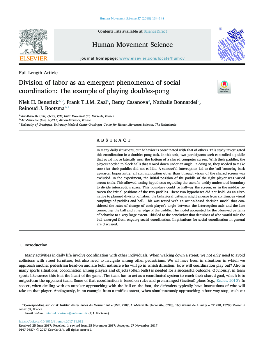 Division of labor as an emergent phenomenon of social coordination: The example of playing doubles-pong