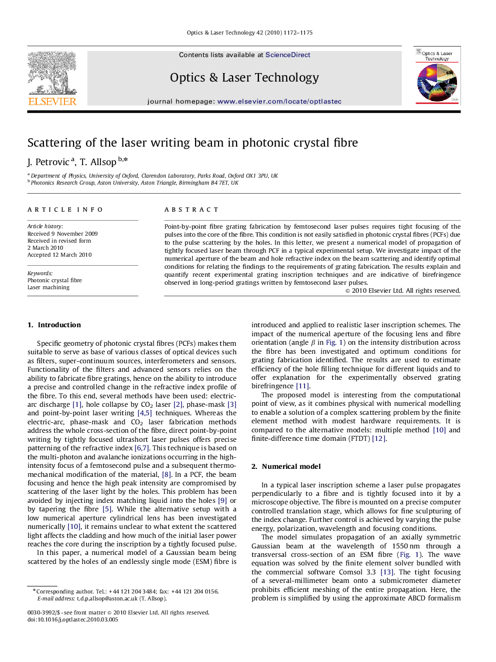 Scattering of the laser writing beam in photonic crystal fibre