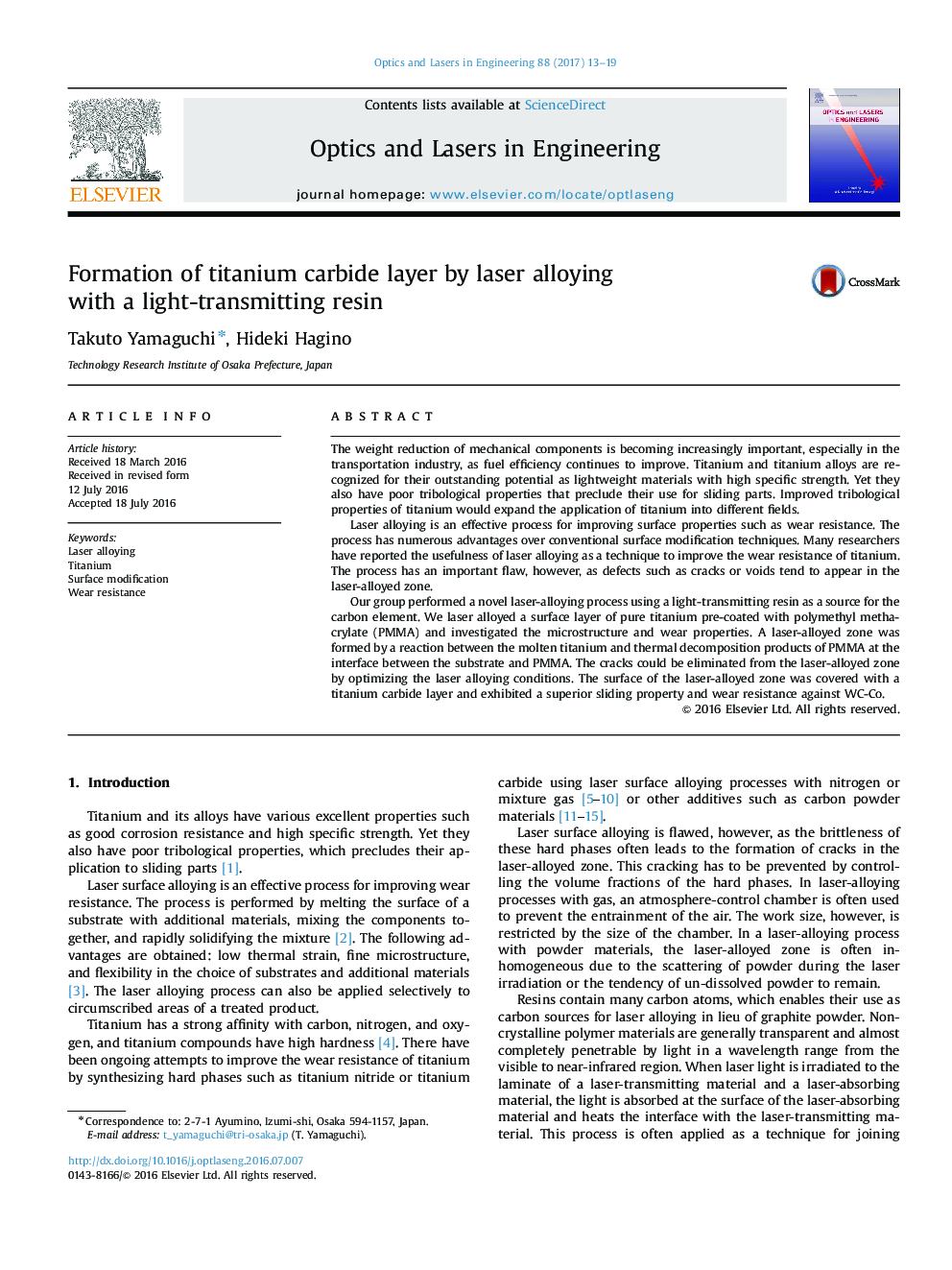 Formation of titanium carbide layer by laser alloying with a light-transmitting resin