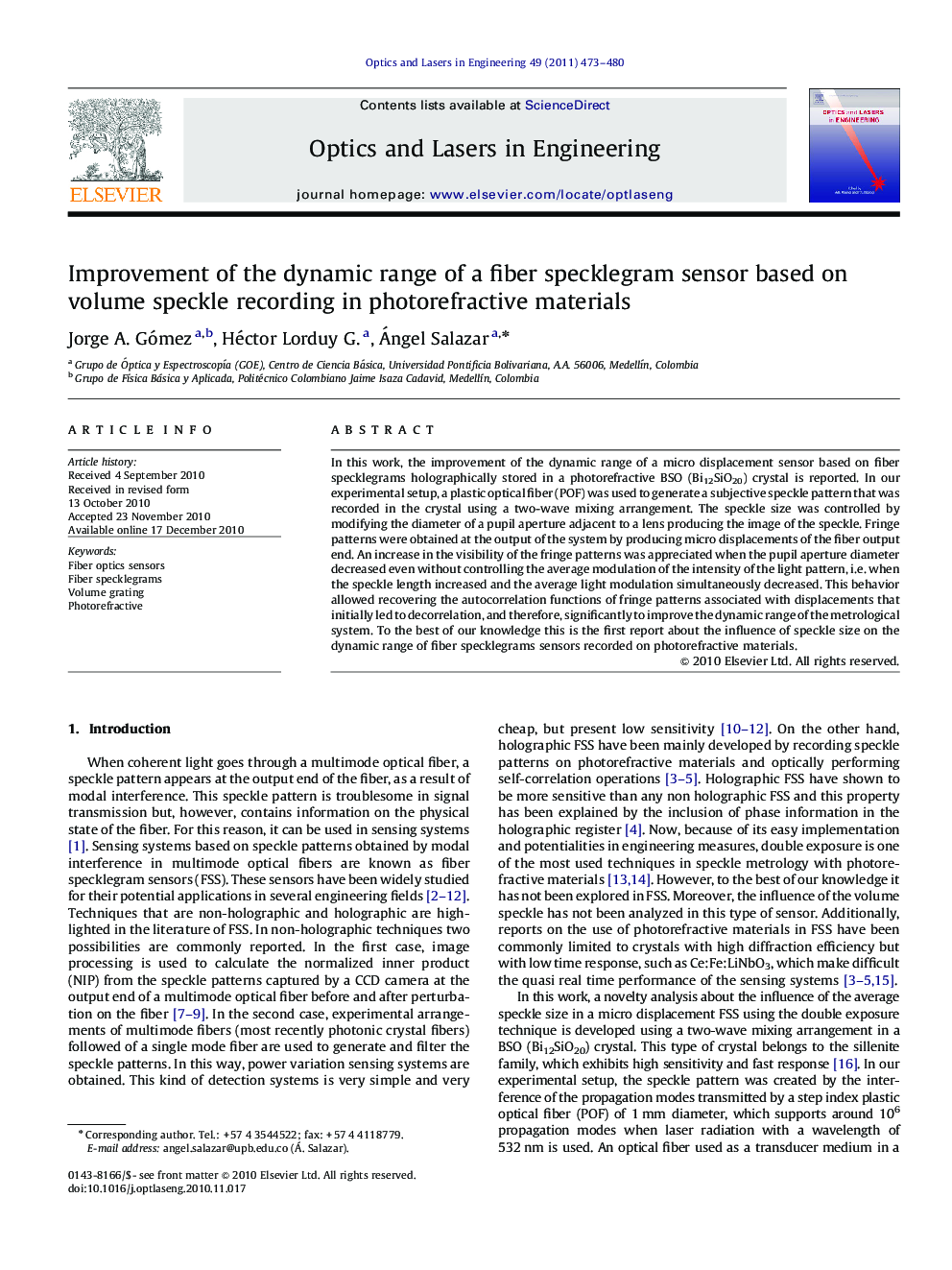 Improvement of the dynamic range of a fiber specklegram sensor based on volume speckle recording in photorefractive materials