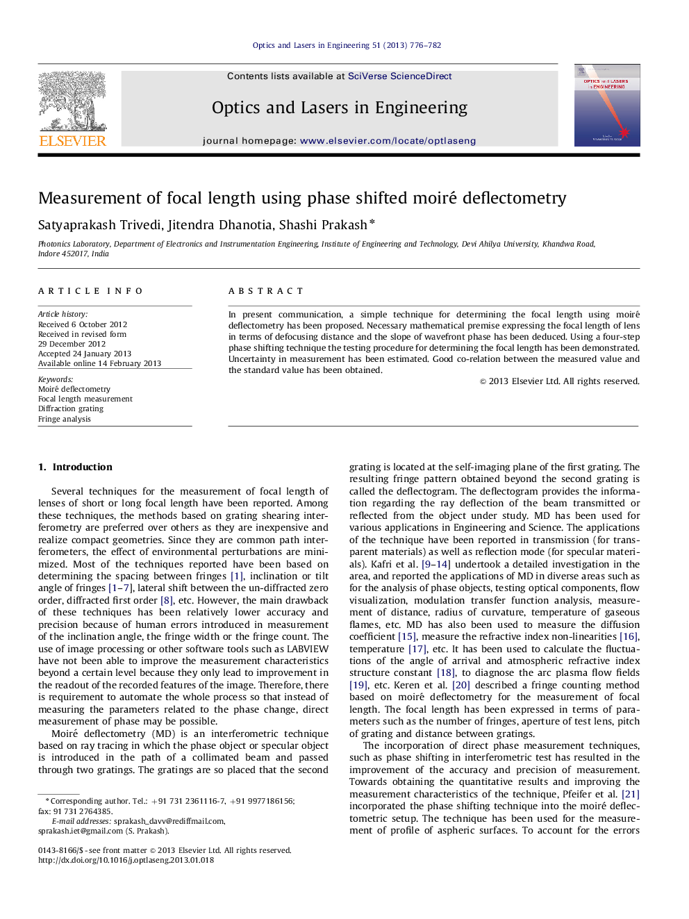 Measurement of focal length using phase shifted moiré deflectometry