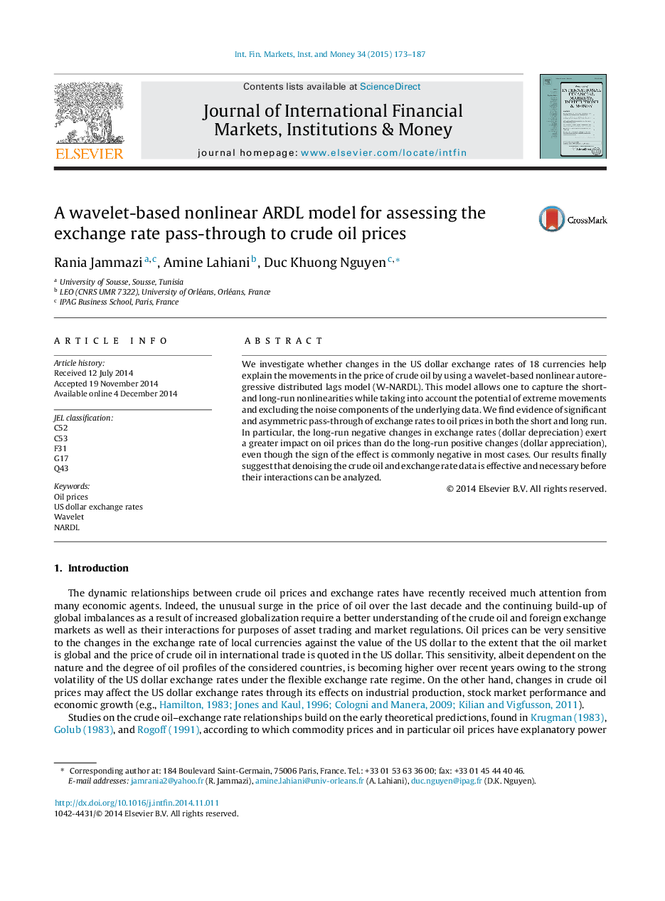 A wavelet-based nonlinear ARDL model for assessing the exchange rate pass-through to crude oil prices