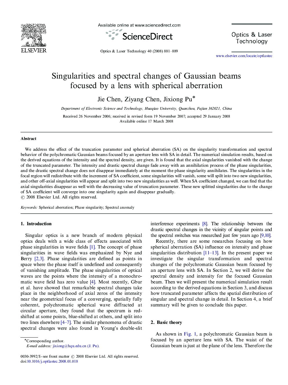 Singularities and spectral changes of Gaussian beams focused by a lens with spherical aberration