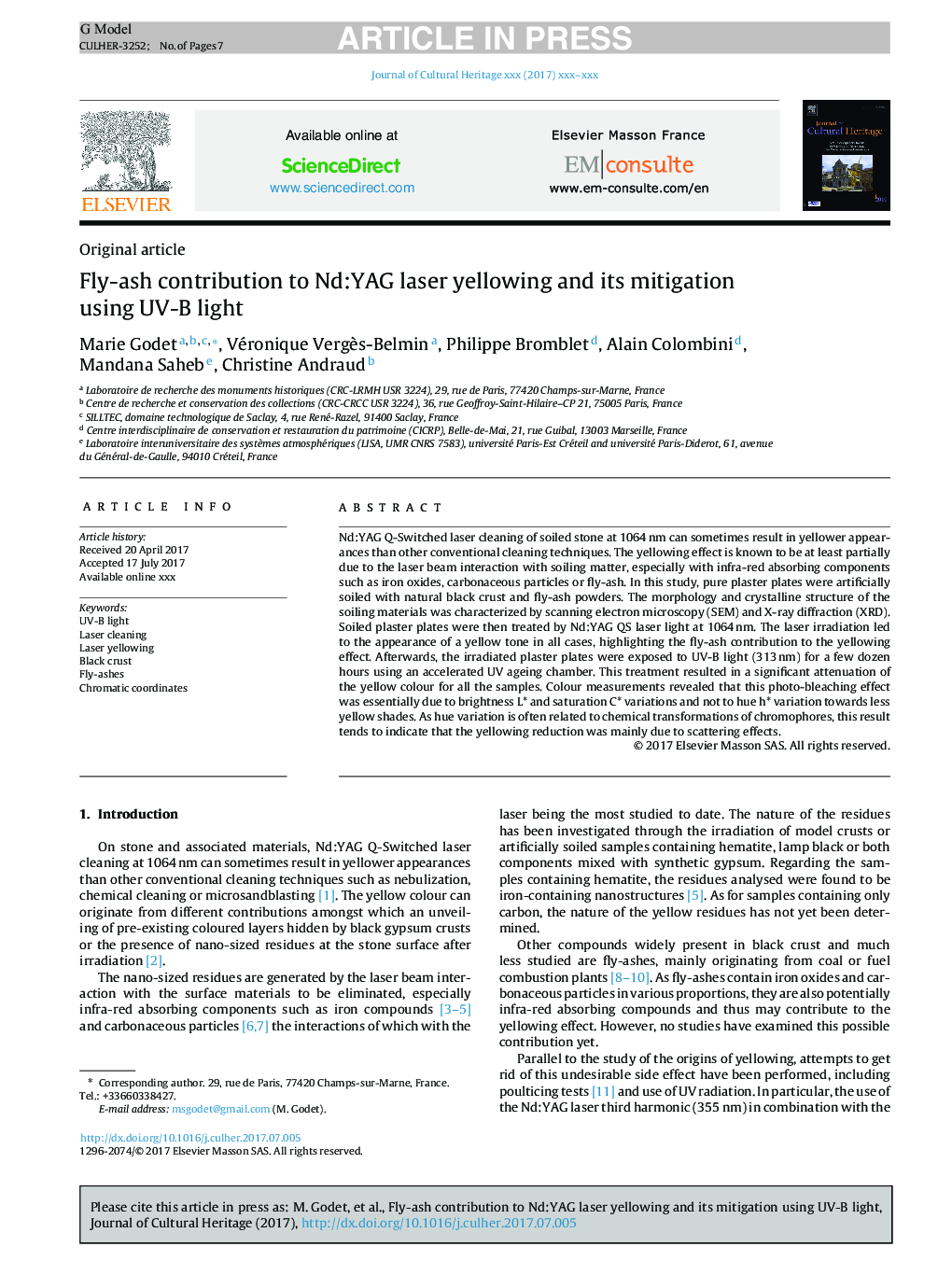 Fly-ash contribution to Nd:YAG laser yellowing and its mitigation using UV-B light