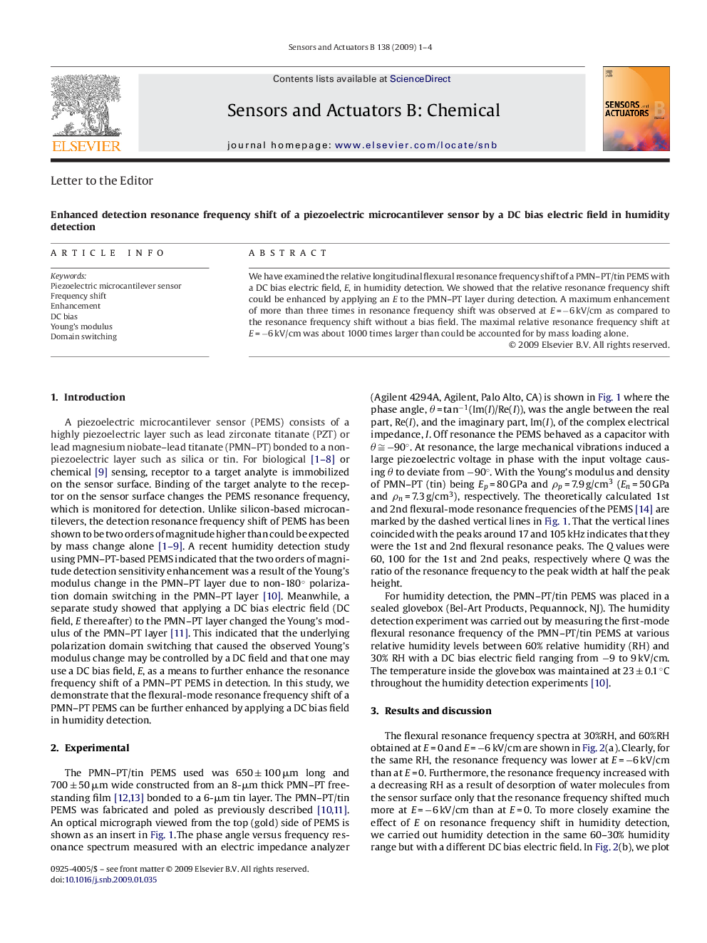 Enhanced detection resonance frequency shift of a piezoelectric microcantilever sensor by a DC bias electric field in humidity detection