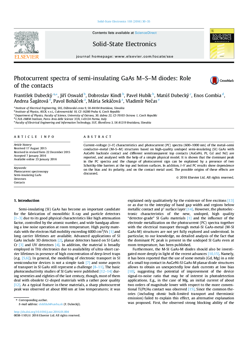 Photocurrent spectra of semi-insulating GaAs M–S–M diodes: Role of the contacts