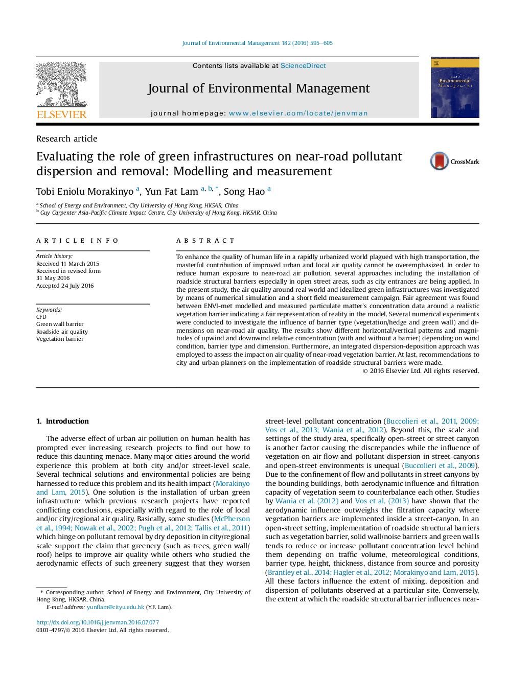 Evaluating the role of green infrastructures on near-road pollutant dispersion and removal: Modelling and measurement