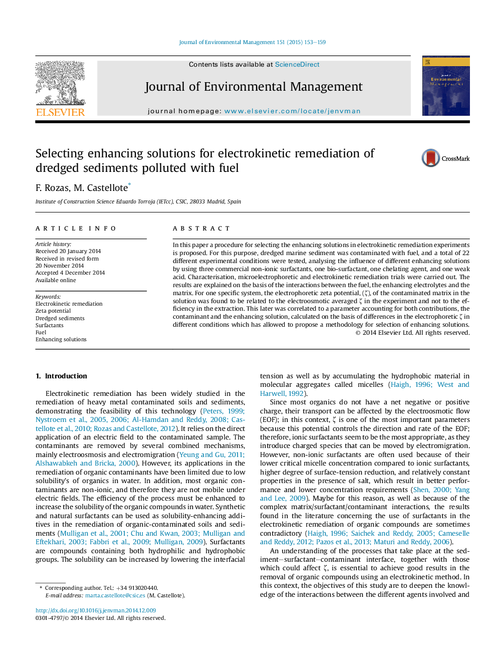 Selecting enhancing solutions for electrokinetic remediation of dredged sediments polluted with fuel