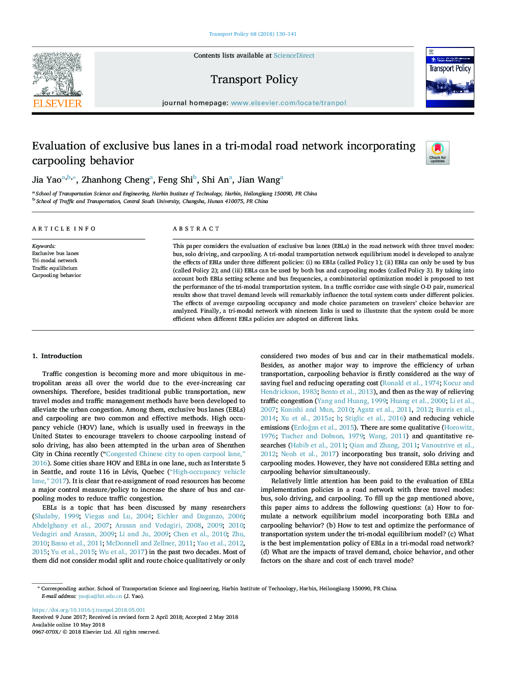 Evaluation of exclusive bus lanes in a tri-modal road network incorporating carpooling behavior