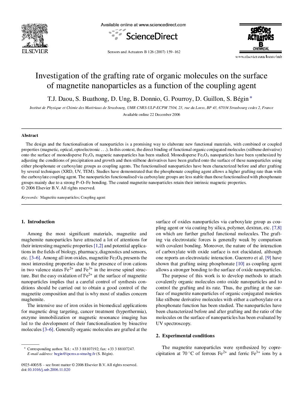 Investigation of the grafting rate of organic molecules on the surface of magnetite nanoparticles as a function of the coupling agent