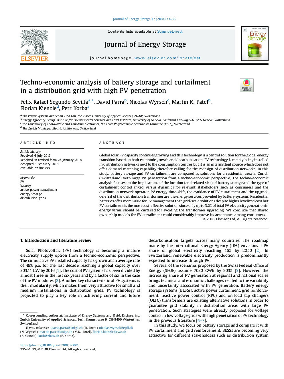 Techno-economic analysis of battery storage and curtailment in a distribution grid with high PV penetration