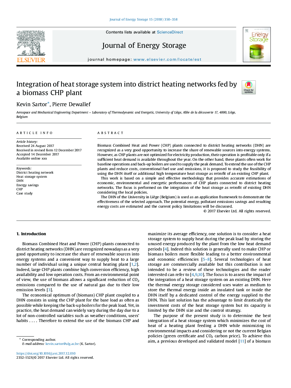 Integration of heat storage system into district heating networks fed by a biomass CHP plant