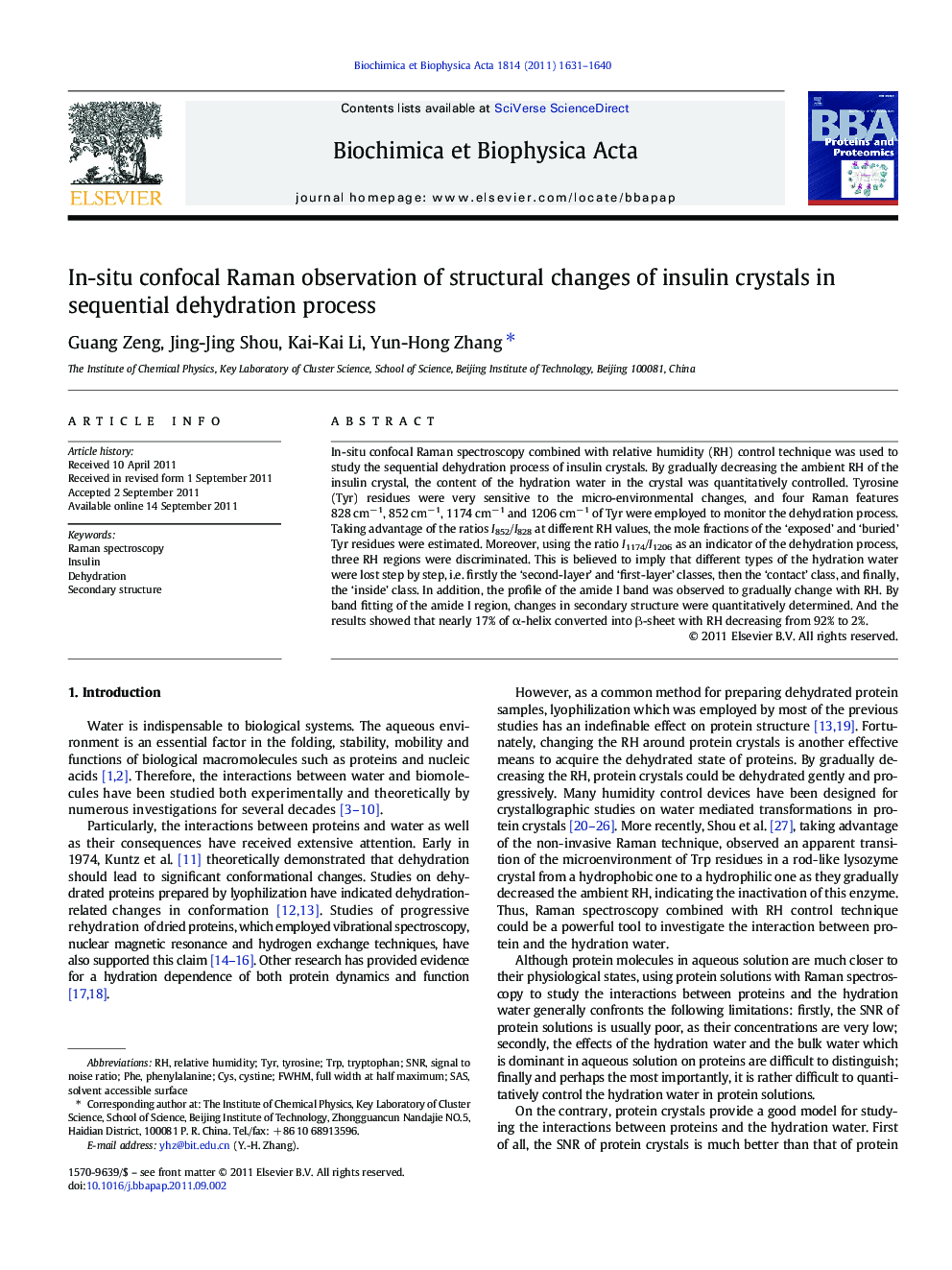 In-situ confocal Raman observation of structural changes of insulin crystals in sequential dehydration process