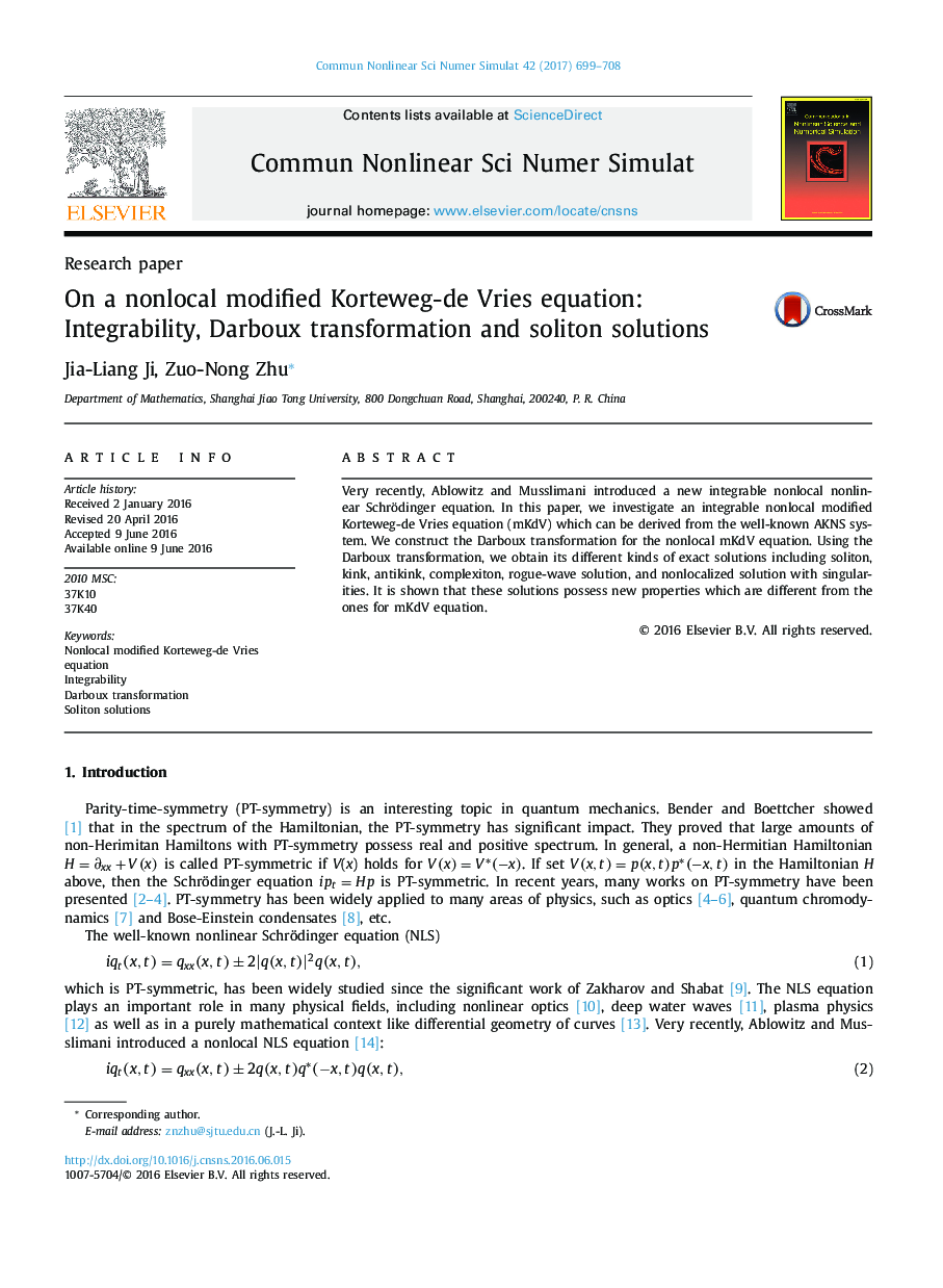 On a nonlocal modified Korteweg-de Vries equation: Integrability, Darboux transformation and soliton solutions