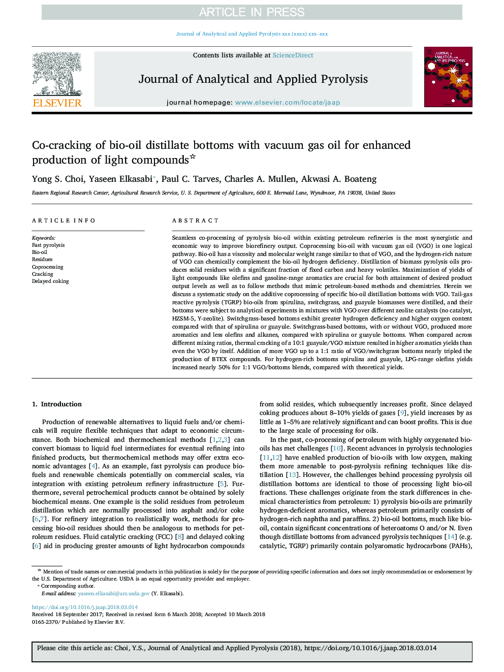 Co-cracking of bio-oil distillate bottoms with vacuum gas oil for enhanced production of light compounds