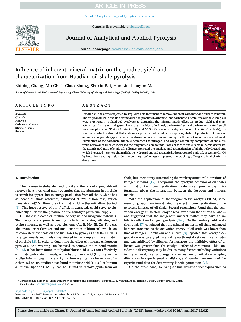 Influence of inherent mineral matrix on the product yield and characterization from Huadian oil shale pyrolysis