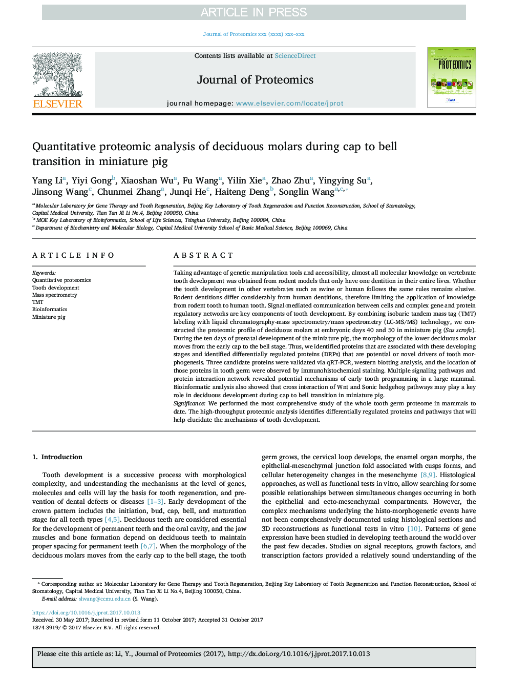 Quantitative proteomic analysis of deciduous molars during cap to bell transition in miniature pig