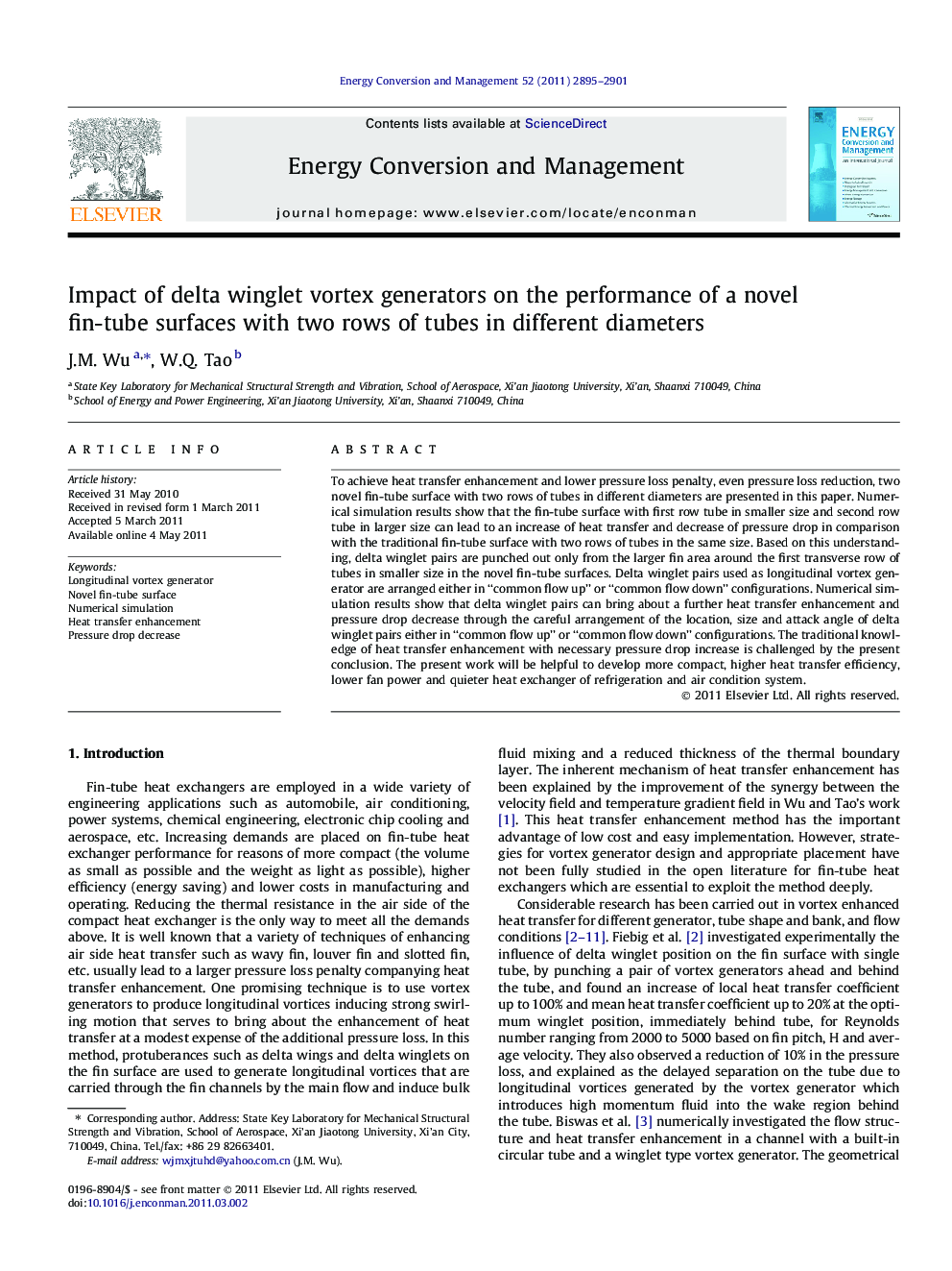 Impact of delta winglet vortex generators on the performance of a novel fin-tube surfaces with two rows of tubes in different diameters