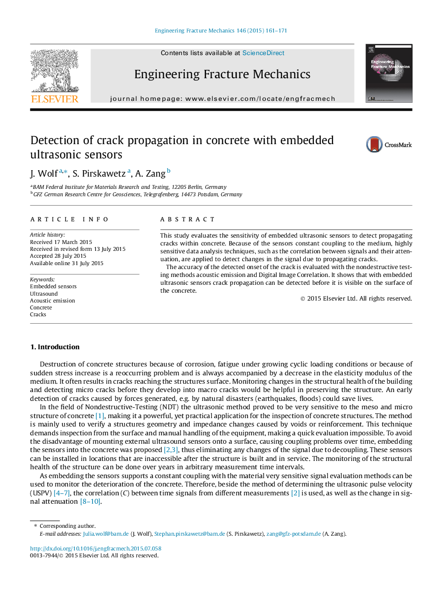 Detection of crack propagation in concrete with embedded ultrasonic sensors