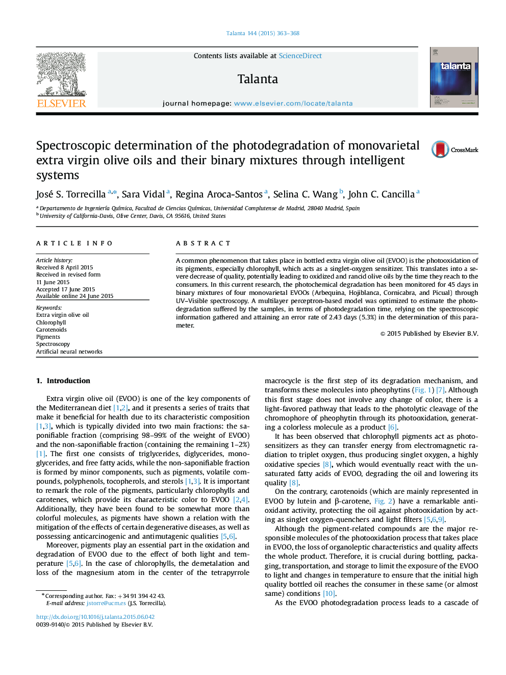 Spectroscopic determination of the photodegradation of monovarietal extra virgin olive oils and their binary mixtures through intelligent systems