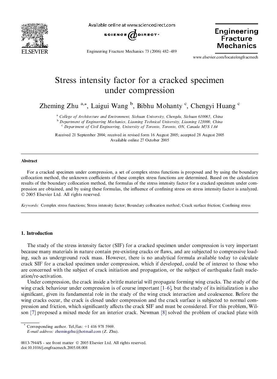 Stress intensity factor for a cracked specimen under compression