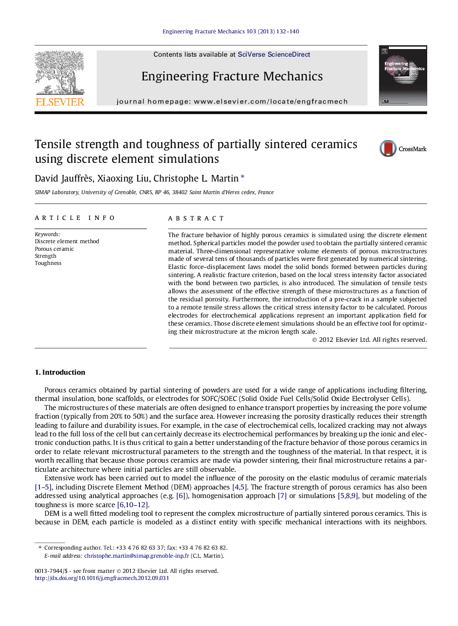 Tensile strength and toughness of partially sintered ceramics using discrete element simulations